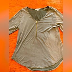 Silky date night top in green with gold zipper